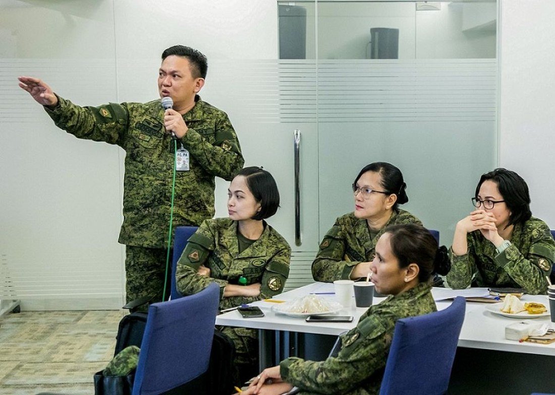 AFP trainer leading a BDO Foundation financial education session for military personnel
